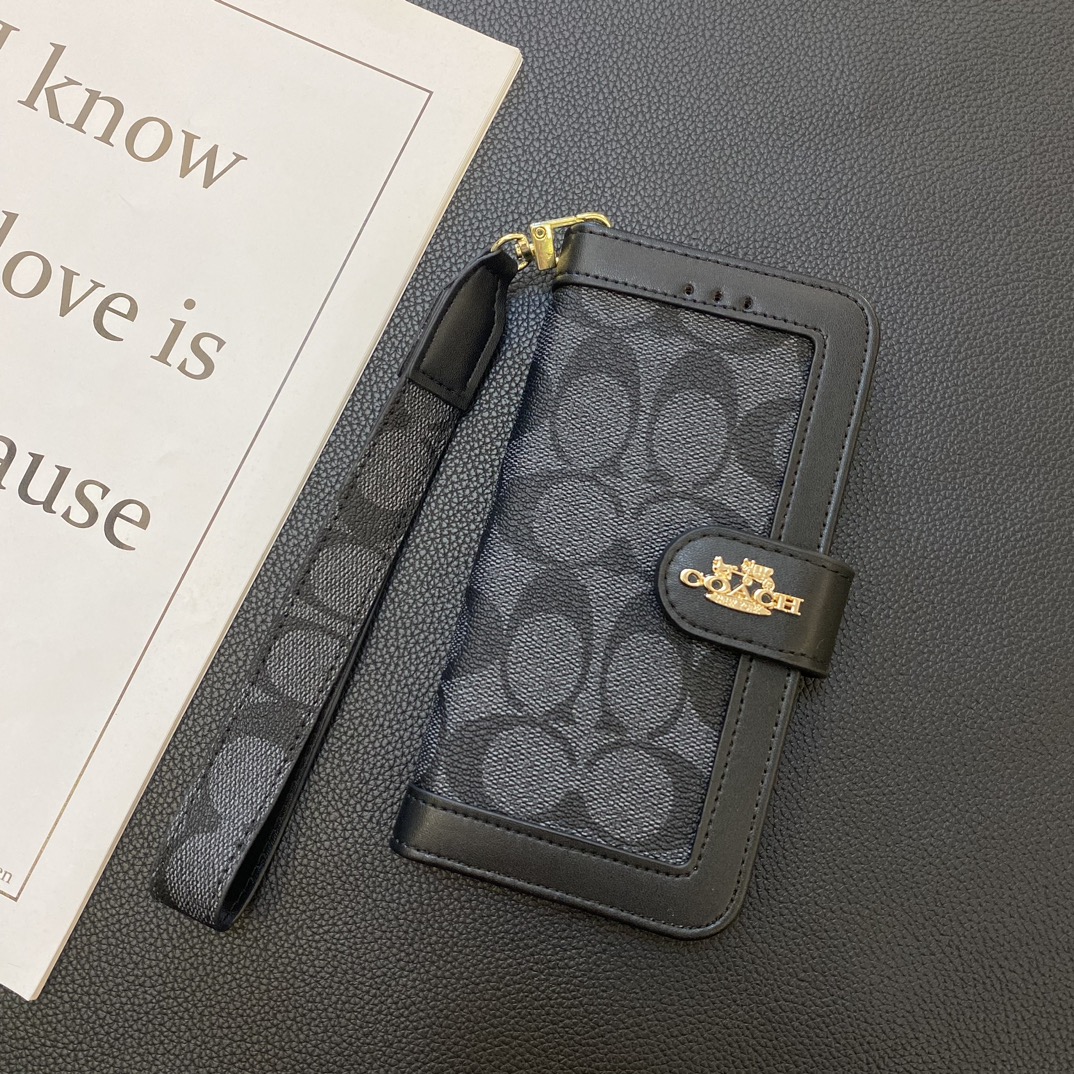 COACHフリップフォンケース zm