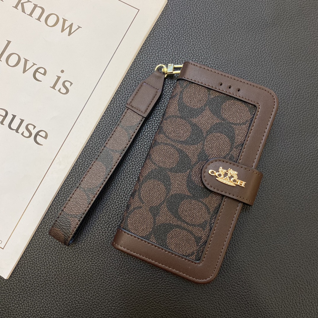 COACHフリップフォンケース zm